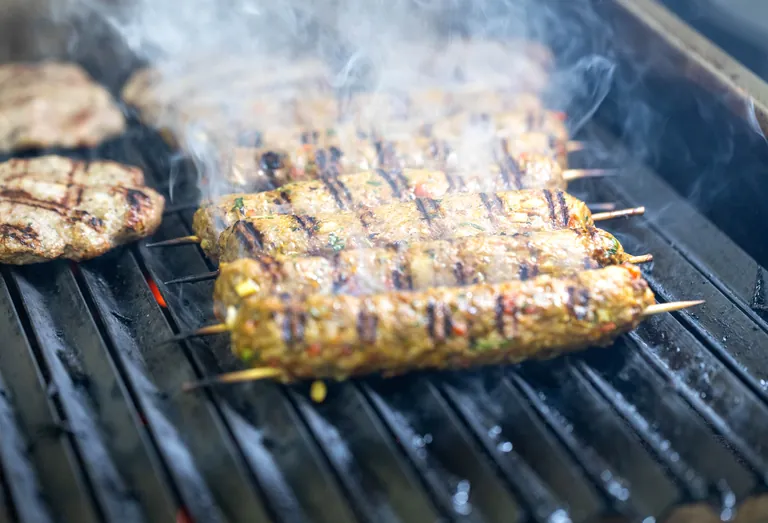 Meat grilling over open flames