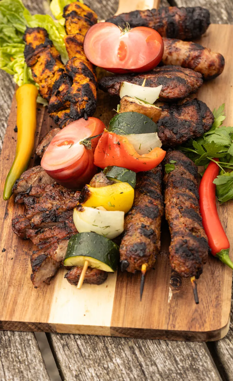 Colourful meat and vegetable skewers ready for the grill